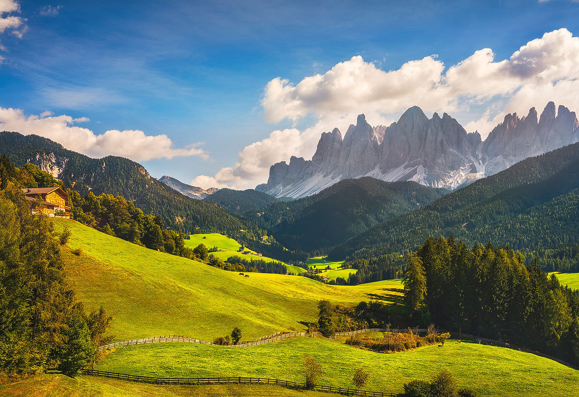 Funes Valley aerial view and Odle mountains, Dolomites Alps. Trentino Alto Adige Sud Tyrol, Italy, Europe