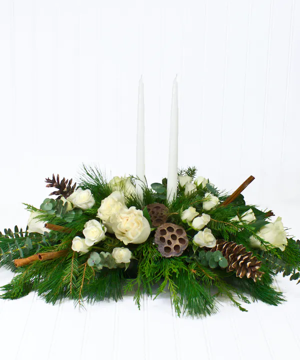 white-pine-centerpiece-candles-roses-19112523905.jpg.webp