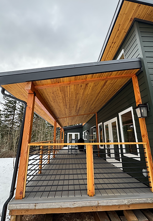 Lanai with cedar soffits and cedar drink rails built for a covered outdoor living space