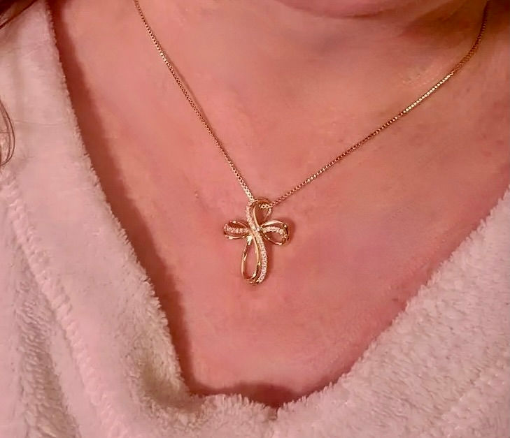 Gold-tone cross necklace with sparkly detail from Addie Grace