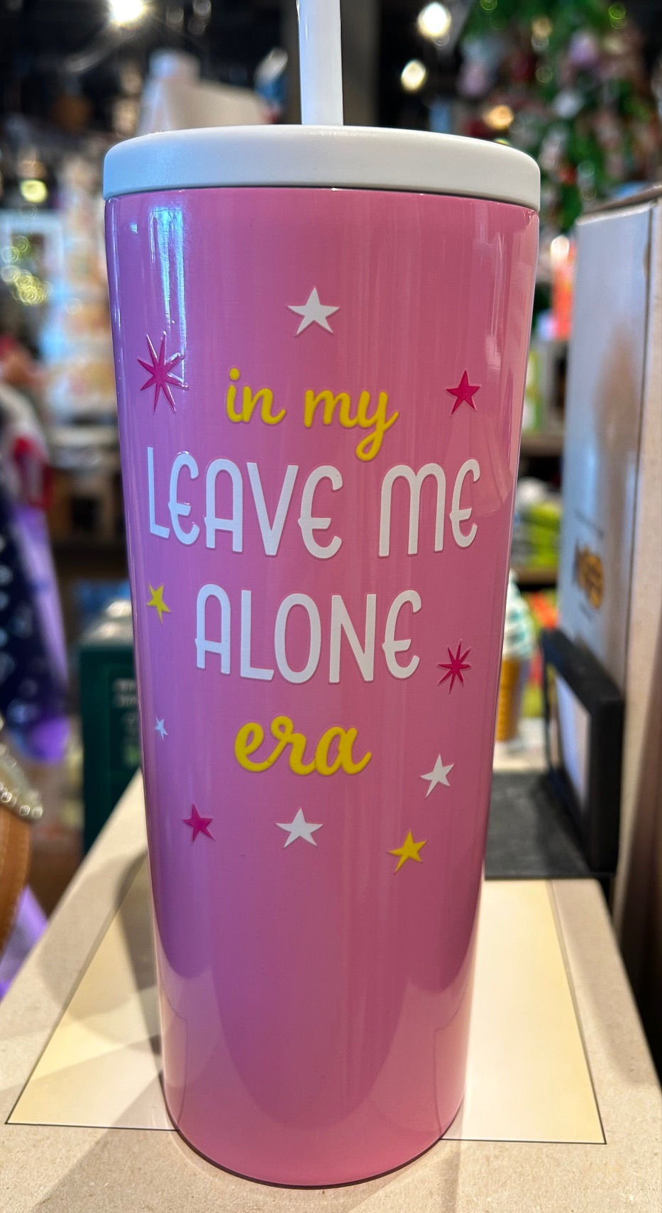 a pink cup that says "in my leave me alone era."