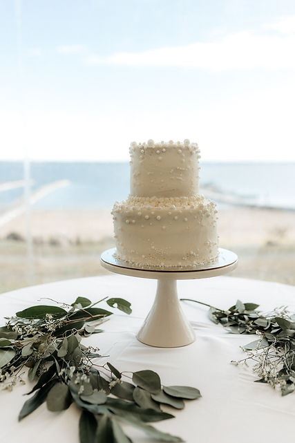 Wedding cake at a lakeside wedding venue