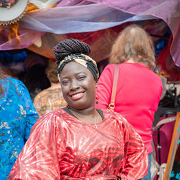 Festival-goers in colourful upcycled outfits at a Second Life event