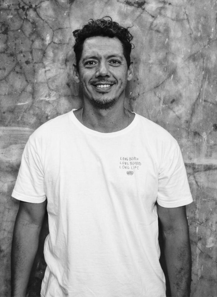 black and white picture of men with curly hair
