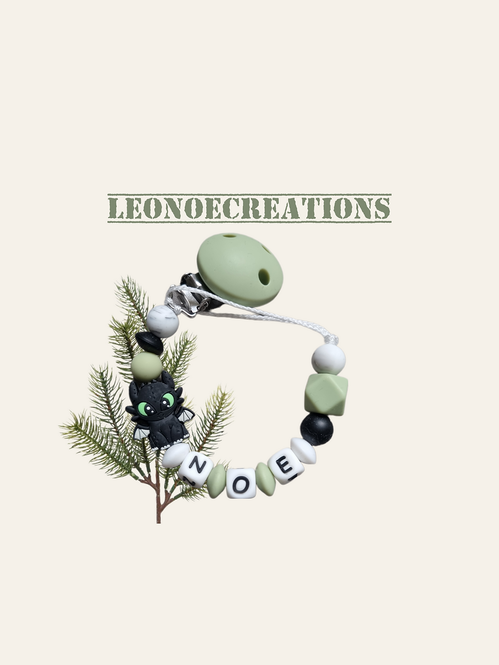 Attache tétine personnalisée silicone dragon krokmou, alliant sécurité, praticité et charme naturel pour accompagner bébé