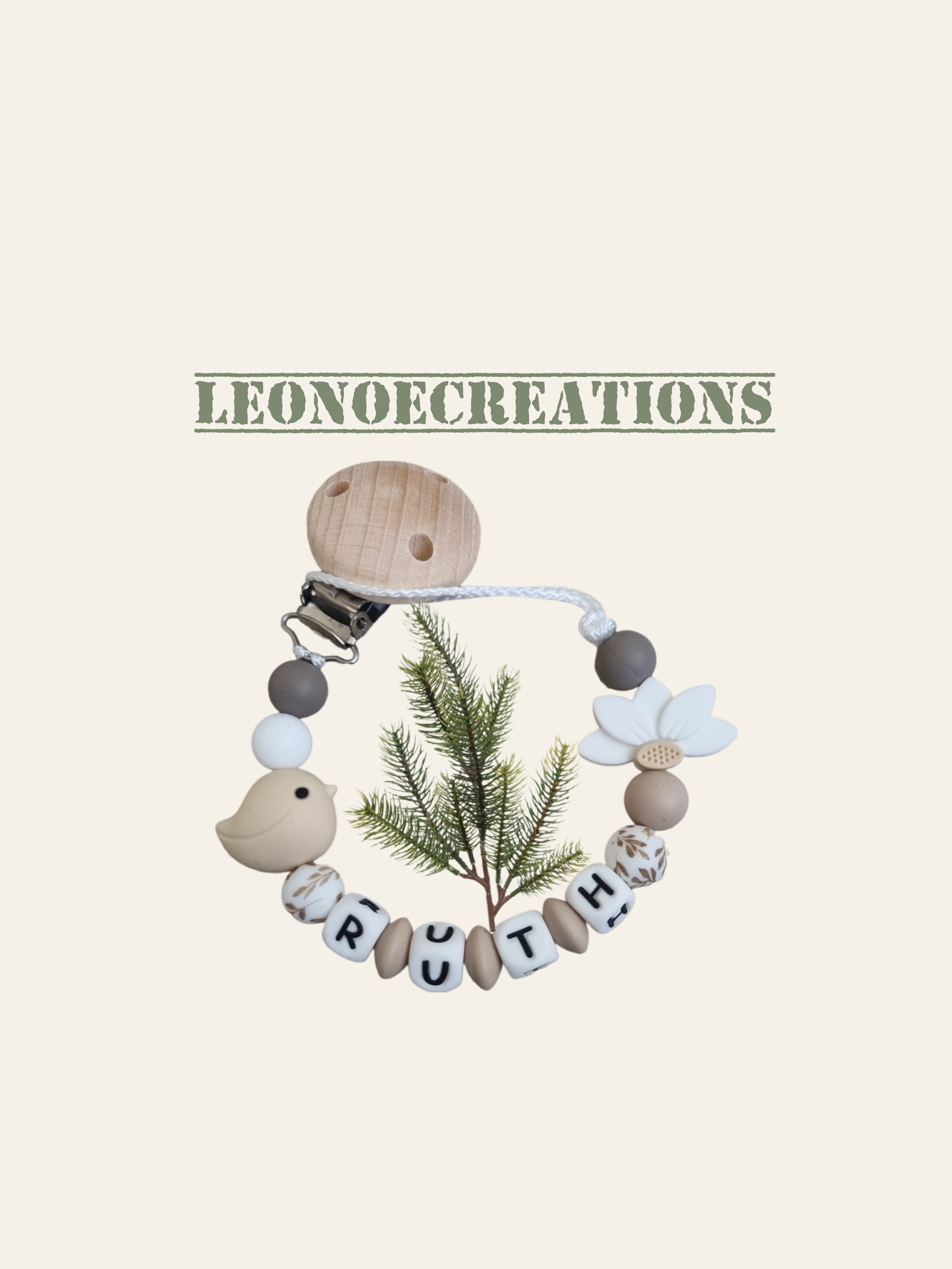 Attache tétine personnalisée silicone oiseau et fleur, alliant sécurité, praticité et charme naturel pour accompagner bébé