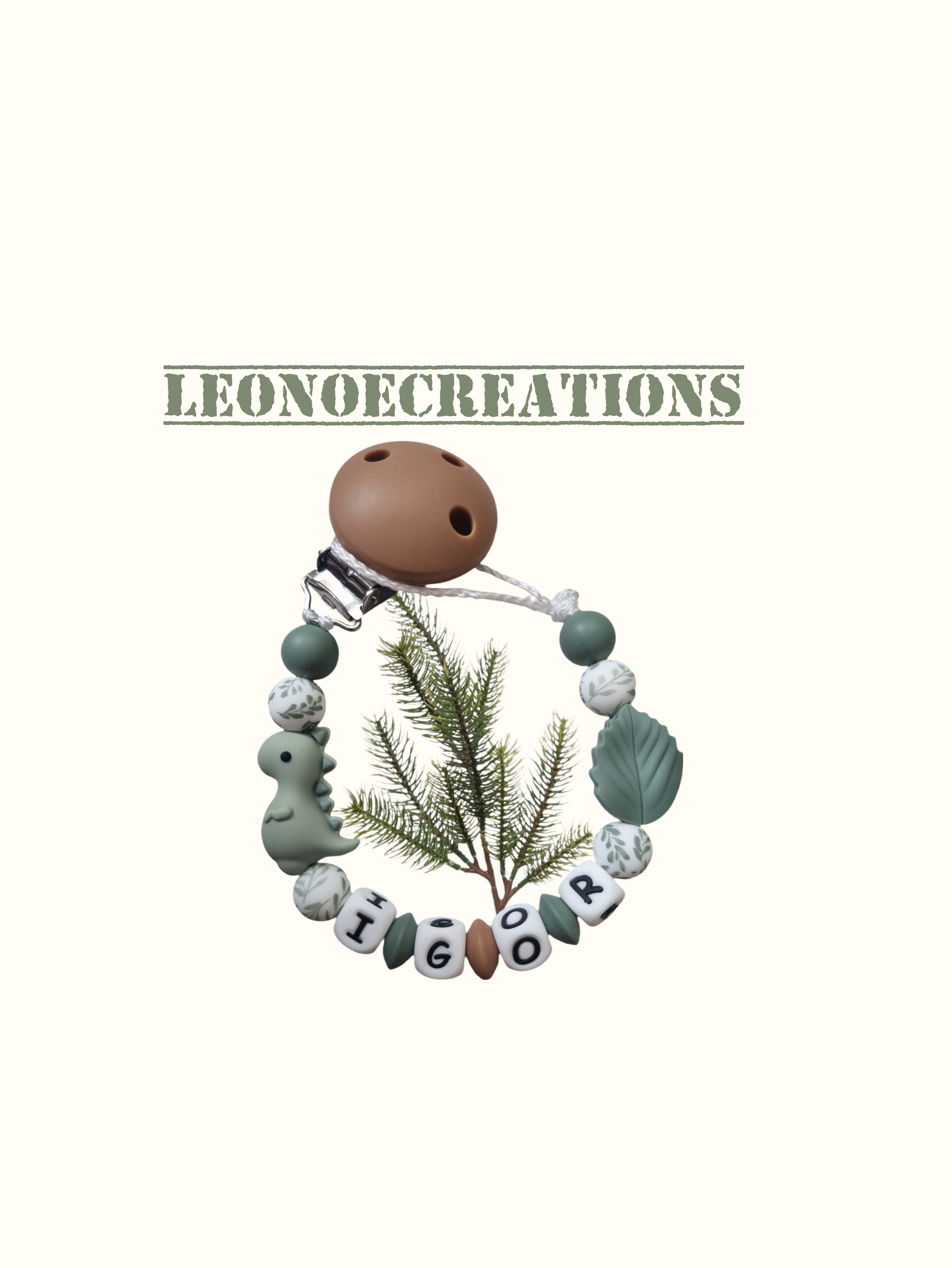 Attache tétine personnalisée bébé – Dinosaure vert, clip silicone et perles 