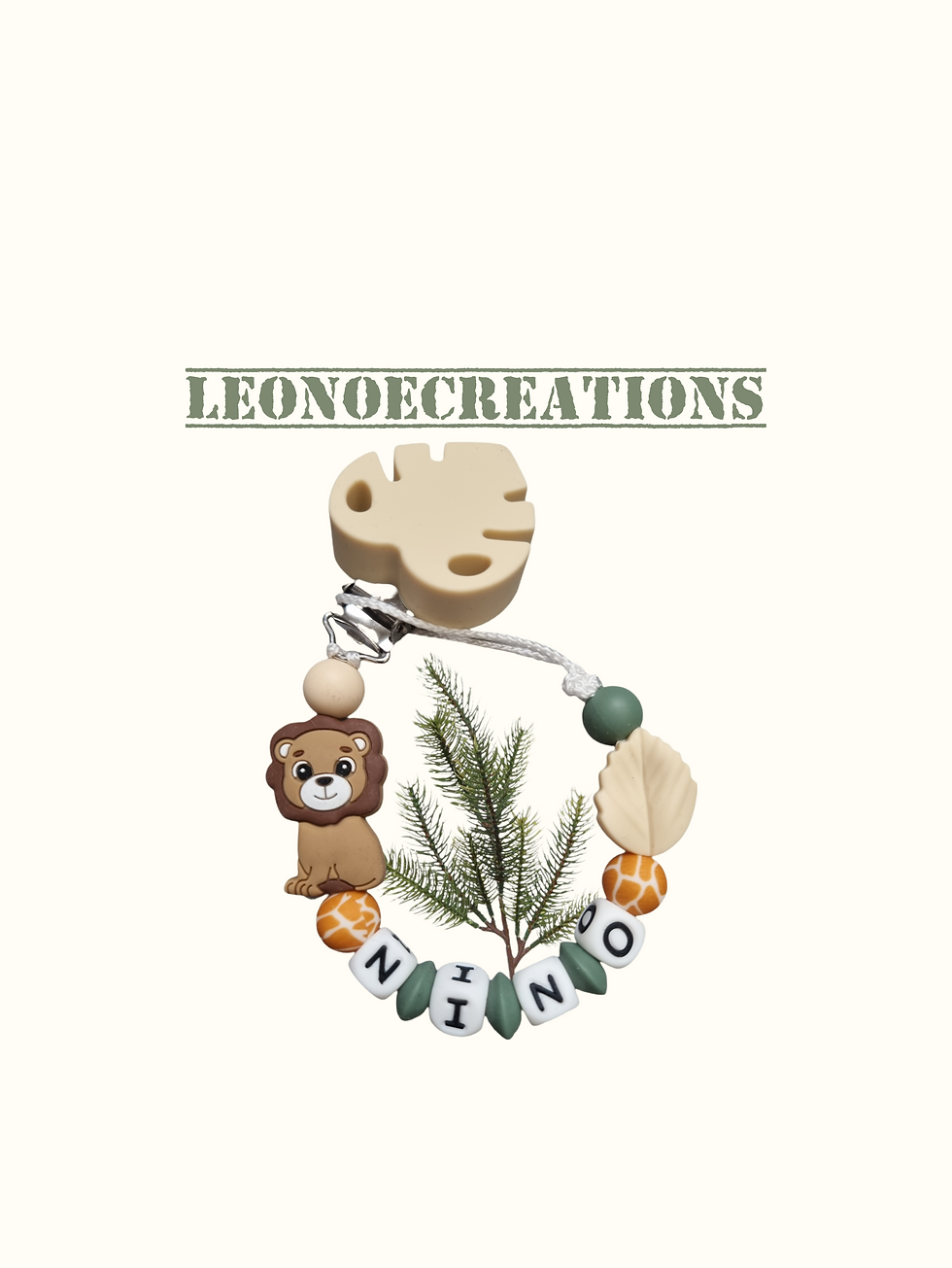 Attache tétine personnalisée silicone motif lion safari, alliant sécurité, praticité et charme naturel pour accompagner bébé