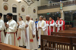Priests and Archbishop