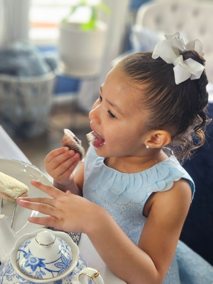Child eating cake.