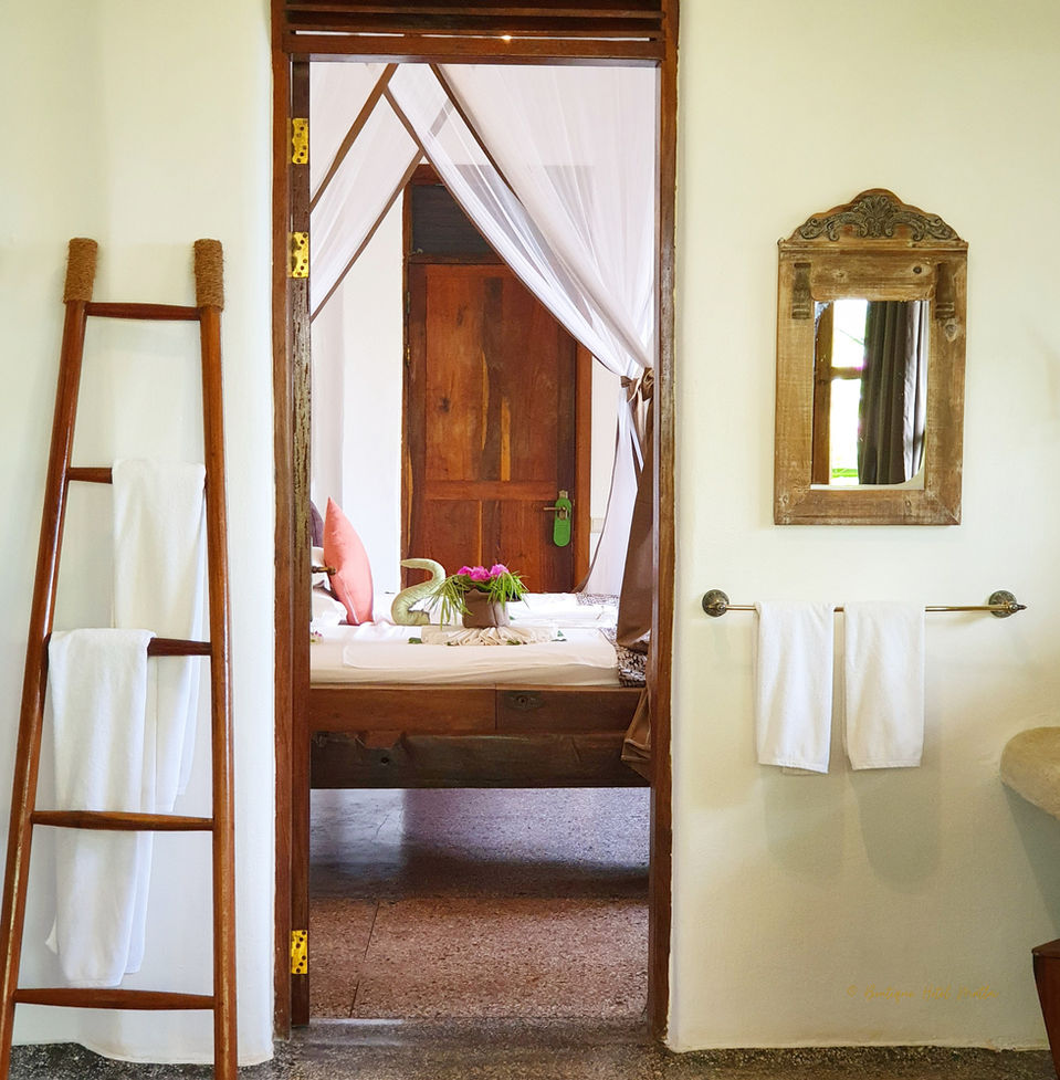 Dunia Room | view from the bathroom into the sleeping room