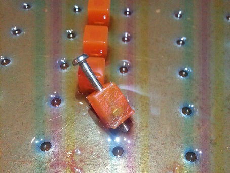 Printing nuts inside parts with a Top Down DLP 3D Printer
