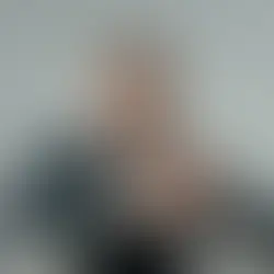 man-in-black-sweater-wearing-eyeglasses