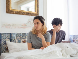 woman-in-gray-shirt-sitting-beside-man