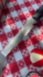 Thumbnail: Close-up of Toasty-Mallows Shorty Roasting Fork on red checkered picnic tablecloth with Babybel cheese for savory s’more