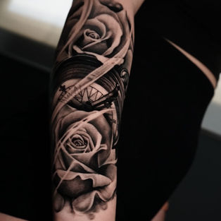 Realism tattoo of flowers