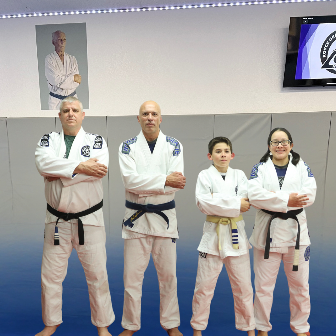 A black belt posing with arms crossed