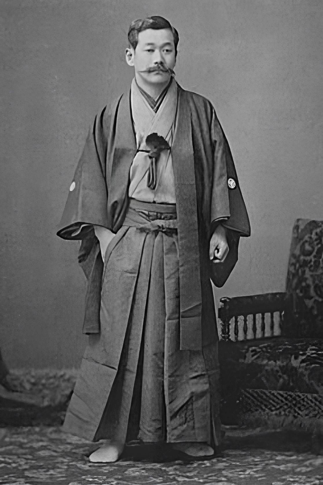 Jigoro Kano posing in a kimono