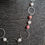 Miniature : Collier en quartz rose, rhodonite et cercles en acier inoxydable