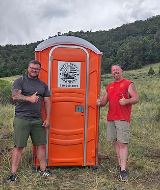 Super Septic Brothers with a porta potty in the Southern Colorado mountains