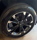 Tire shine applied to make tires look new and enhance the vehicle’s overall appearance.