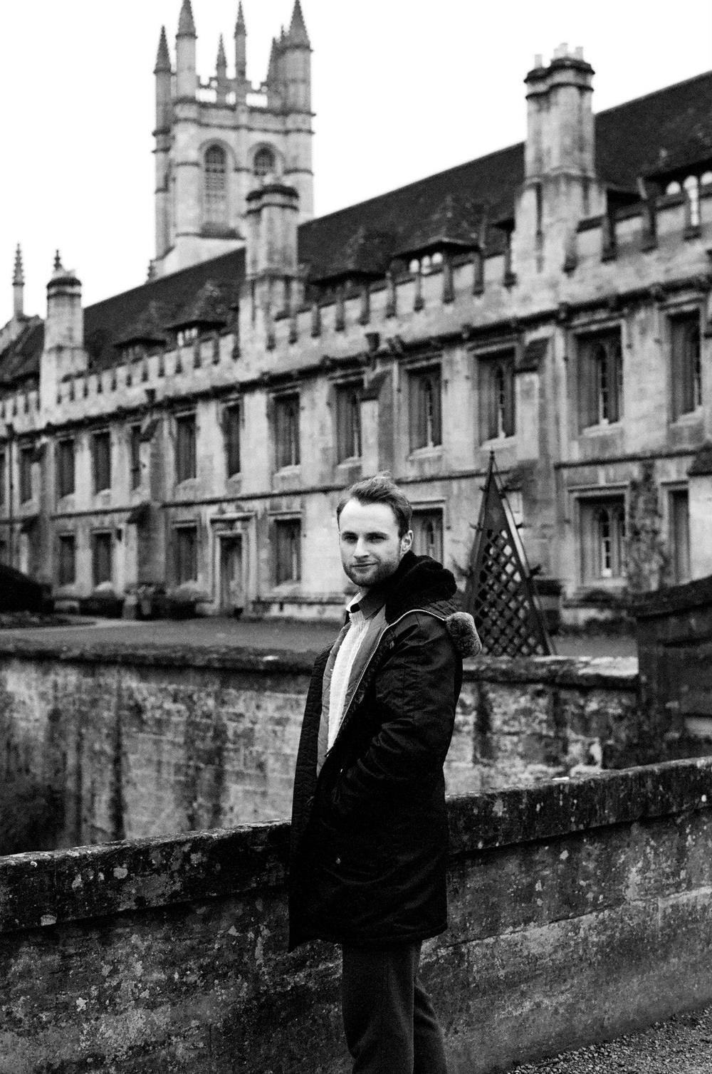 Peter Spalding, Daniel House's Director of Design, standing in front of Magdalen College, Oxford, classical architecture, medieval building, collegiate architecture, magdalen tower