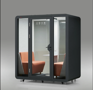 Modern black acoustic privacy pod for two people featuring double clear glass doors and premium orange seating.