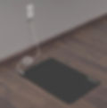 Grounding mat plugged into a wall outlet.