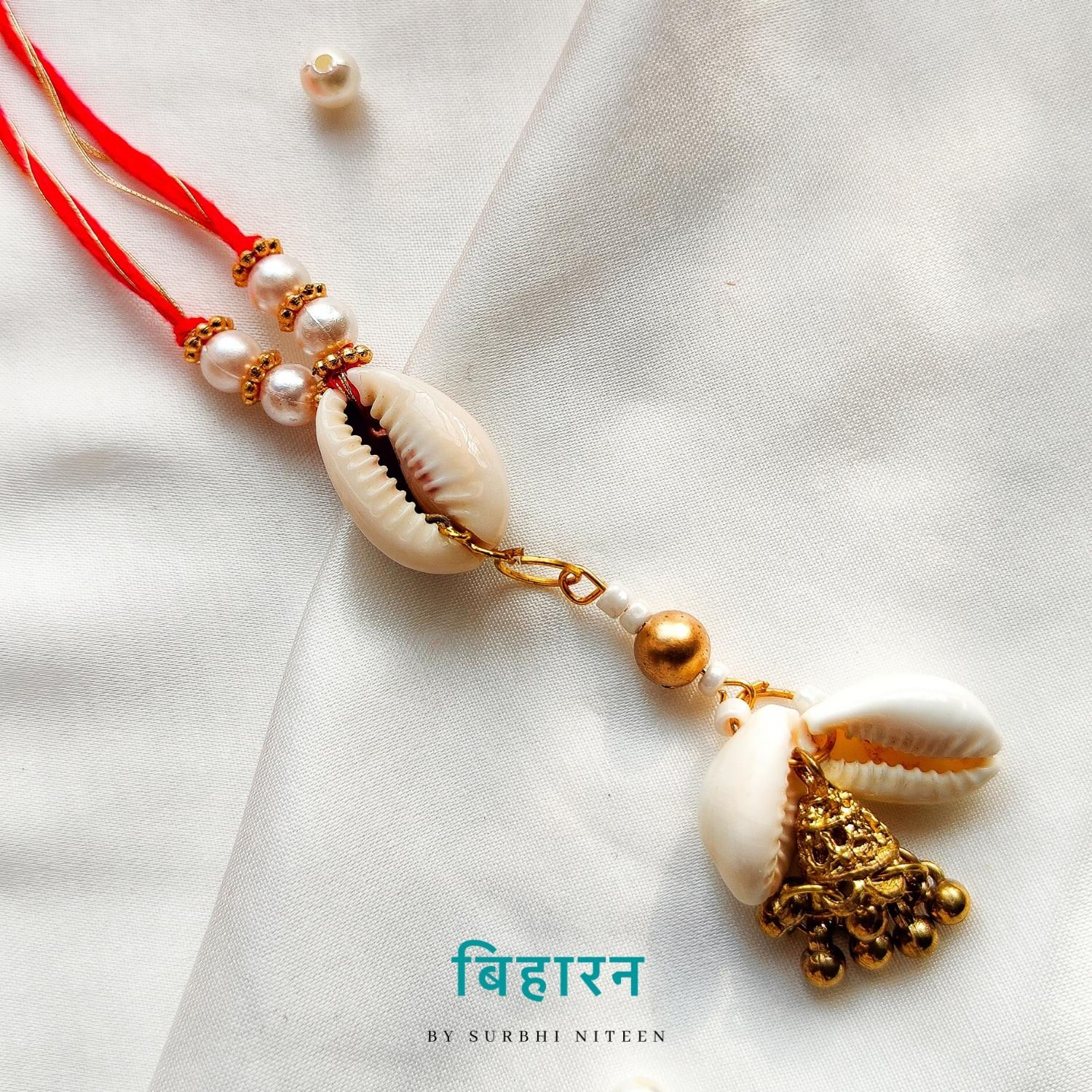Red Elegant Cowrie Rakhi - For Bhabhi/Sister