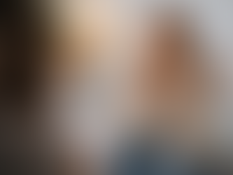 Client using bilateral tapping during EMDR therapy in a warm counseling office