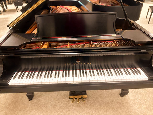This Steinway D concert grand 2003, a powerhouse ideal for concert hall or large sanctuary at an affordable price.