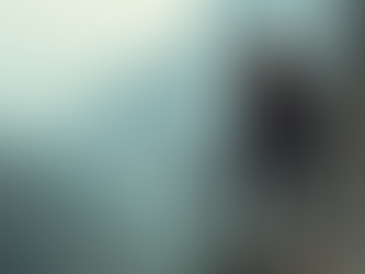 A fierce barbarian warrior overlooking a battlefield