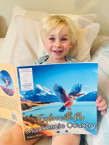 Chester Blain, 3, enjoying mum's book_ed