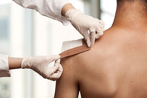 Taping a shoulder wound