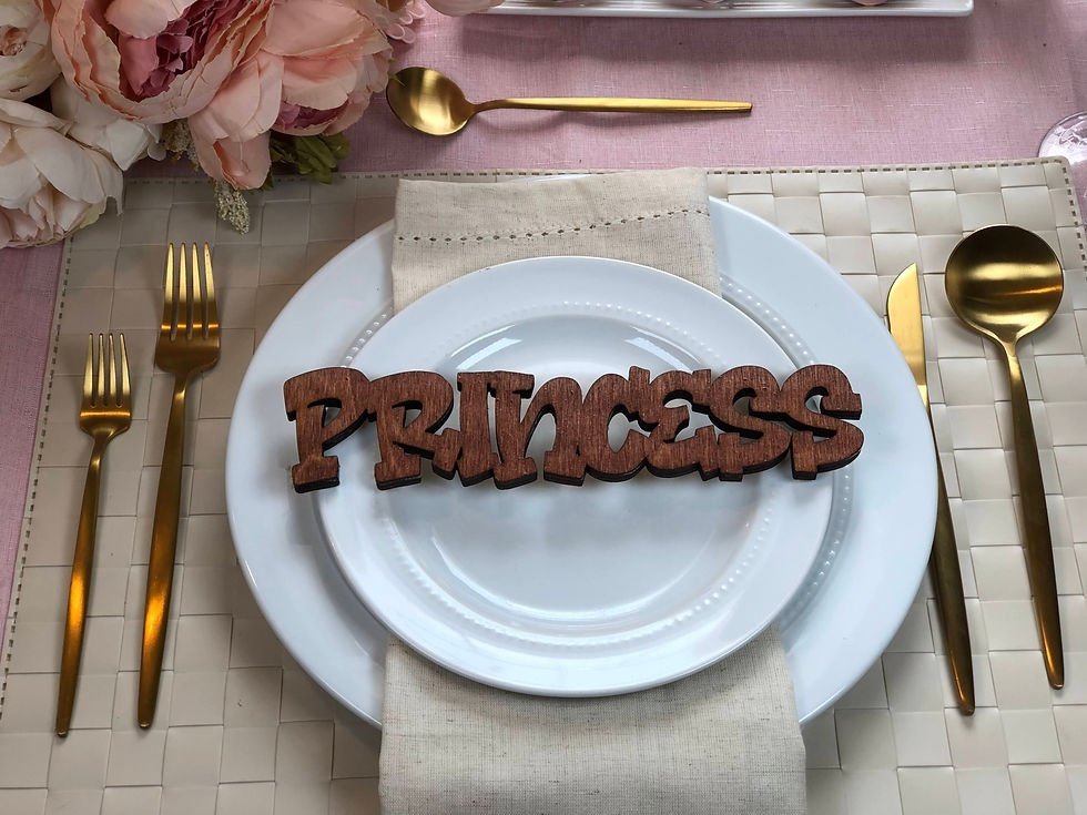 Graffiti-inspired wooden name piece used as event decor