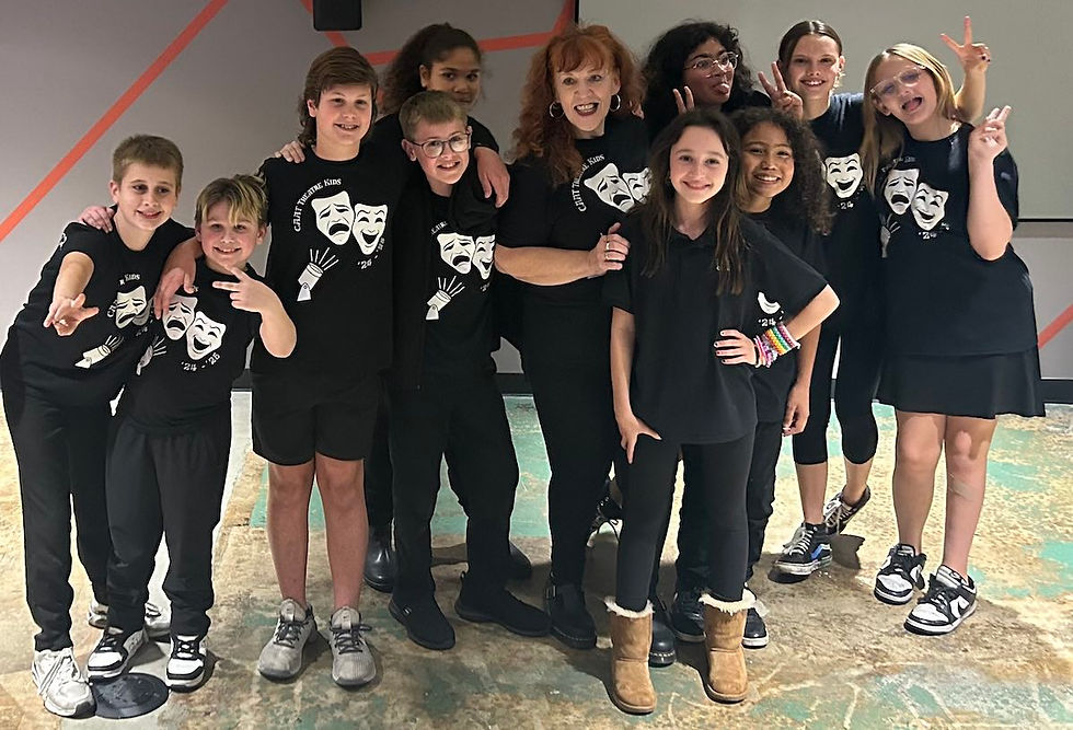 A class of Central Academy of Arts and Technology theater students pose together with their teacher.