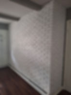 White faux brick wall from painting and ceiling projects
