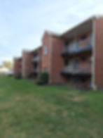 Red brick apartment exterior from painting & ceiling projects