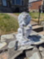 Weathered stone lion statue part of painting projects
