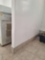 Freshly painted white wall in painting & ceiling projects.