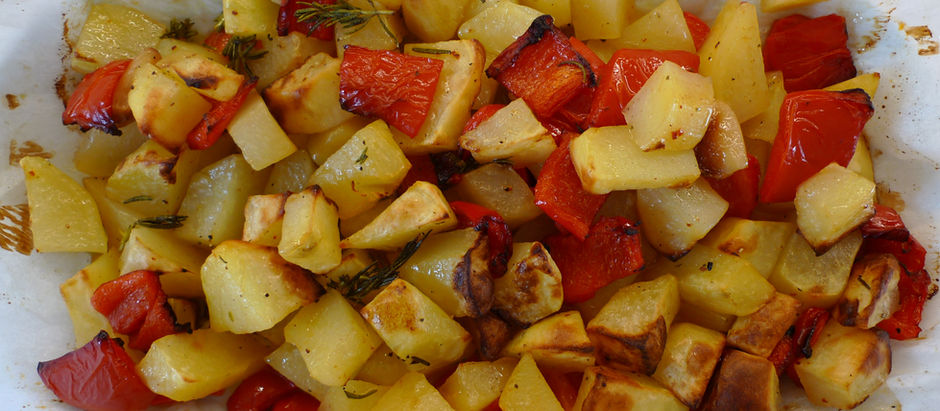 Roasted Potatoes with Red Peppers, Rosemary and Garlic.