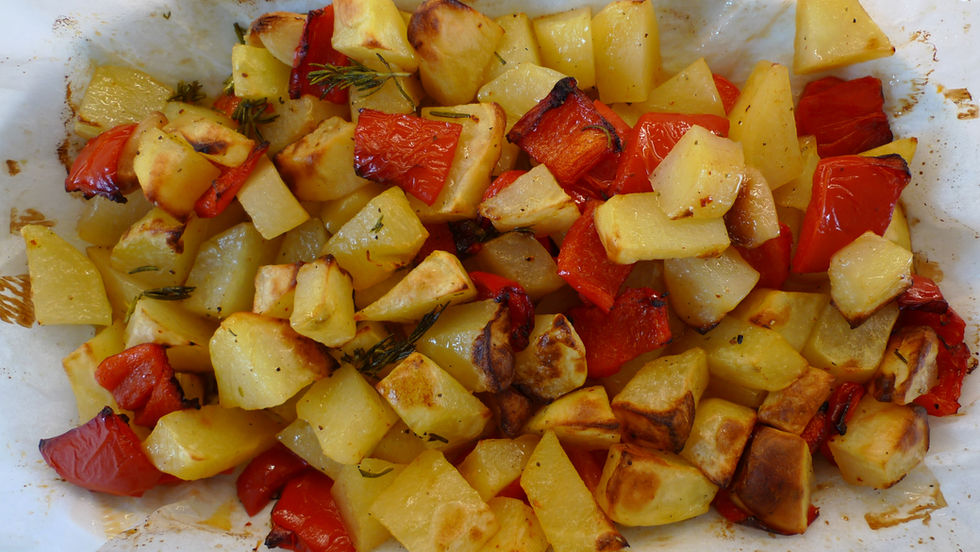 Roasted Potatoes with Red Peppers, Rosemary and Garlic.