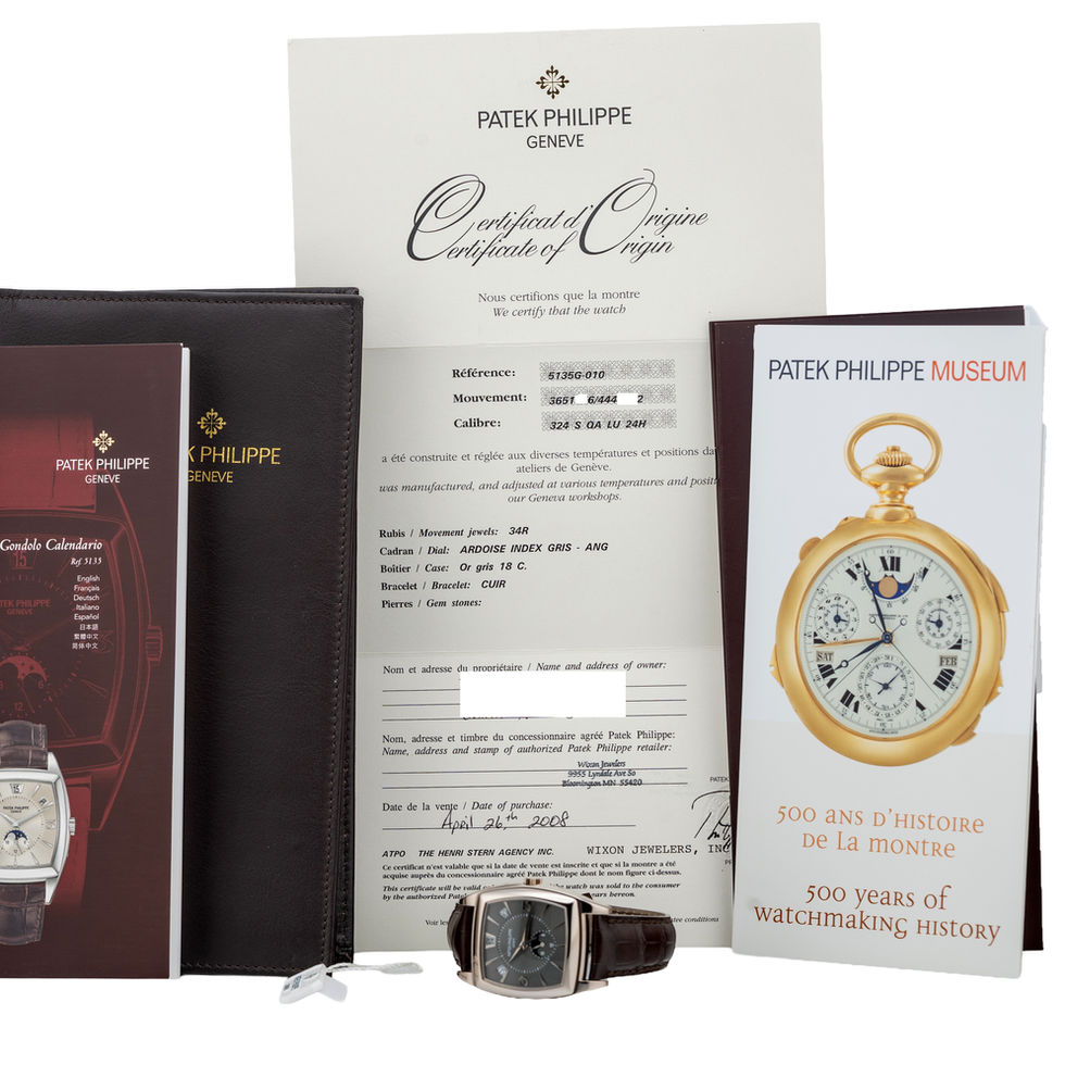Patek Philippe White Gold Gondolo Calendario Ref. 5135G-010 papers