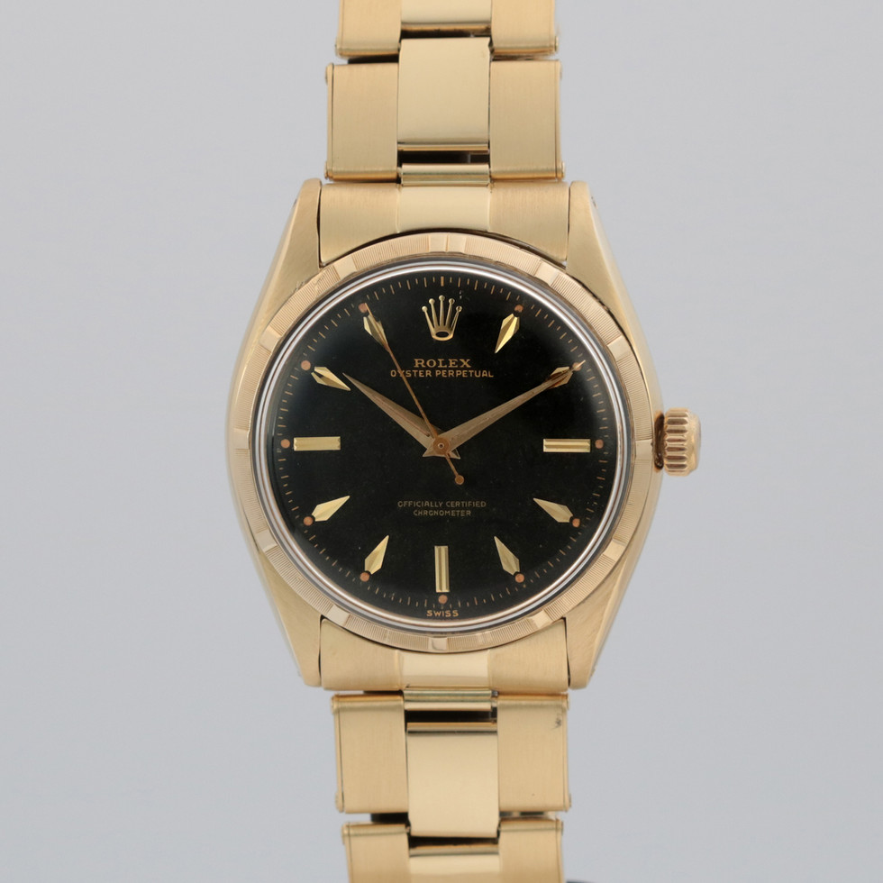 Rolex Oyster Perpetual 14k Black Dial Ref. 6565 front