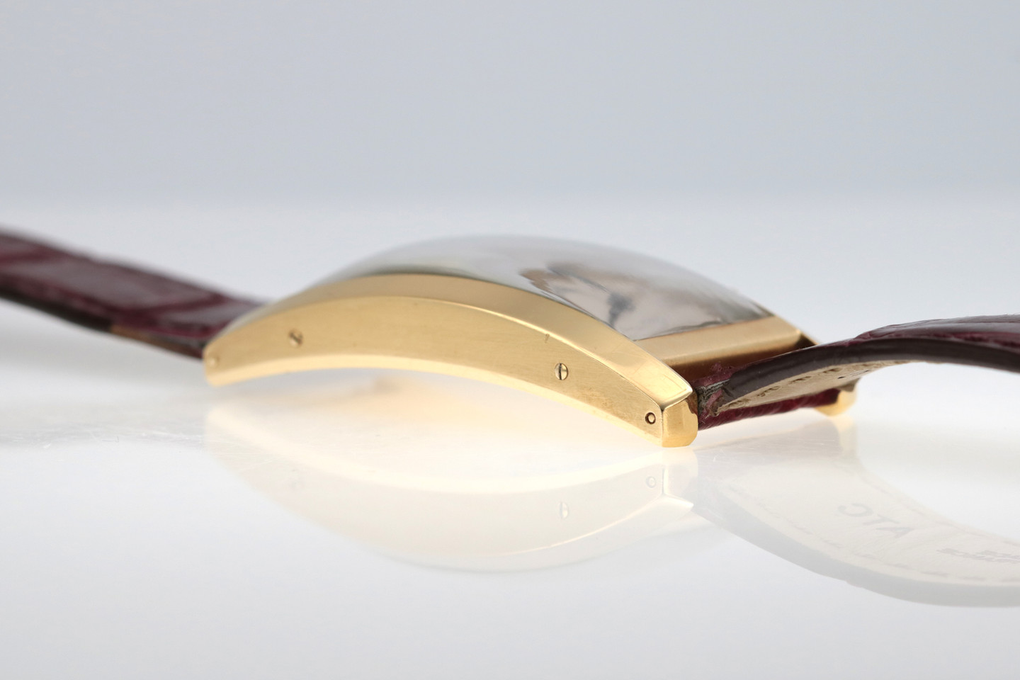 Cartier Tank Cintree Dual Time Zone Yellow Gold lug side