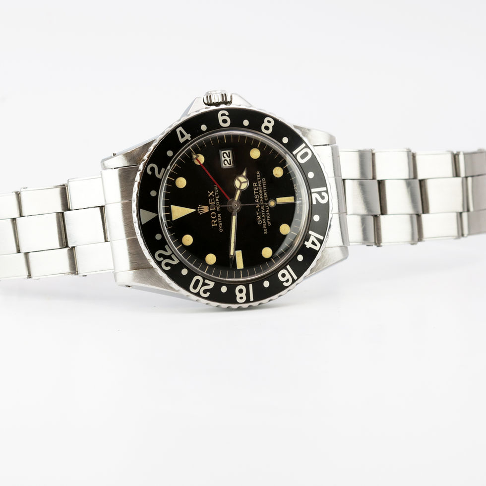 Gilt Dial Rolex GMT Master Ref. 1675 on side
