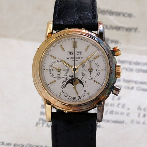 Patek Philippe 3970 Perpetual Calendar Chronograph With Papers as background