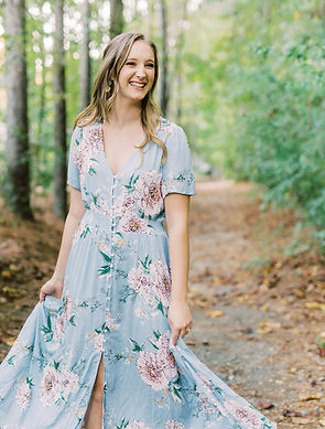 Savanna Jaynes of Savvy Jane Planning posing outdoors