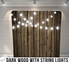 Dark wood with string lights photo booth backdrop