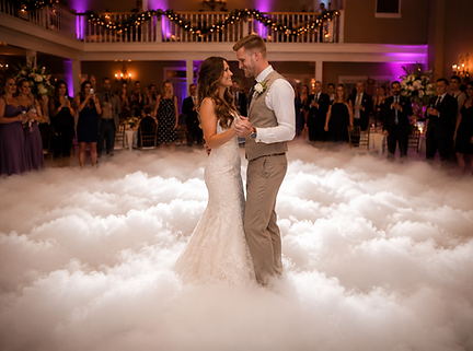 Bride and groom sharing their first dance while dancing on a cloud